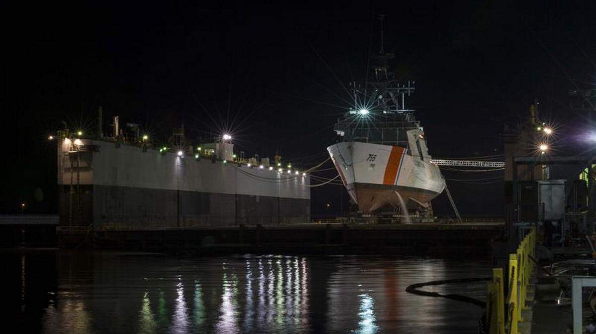 COURTESY INGALLS SHIPBUILDINGThe new Munro sits in the Ingalls floating dry dock ready to launch Sept. 12.