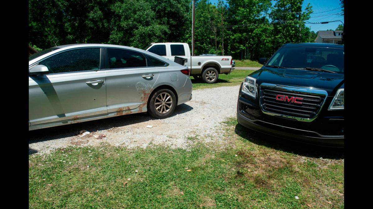 Blood and bullet holes at the scene of a shooting at an after-prom party on Sunday, April 30, 2023, in Bay St. Louis. Two teens were killed in the shooting and four were injured.