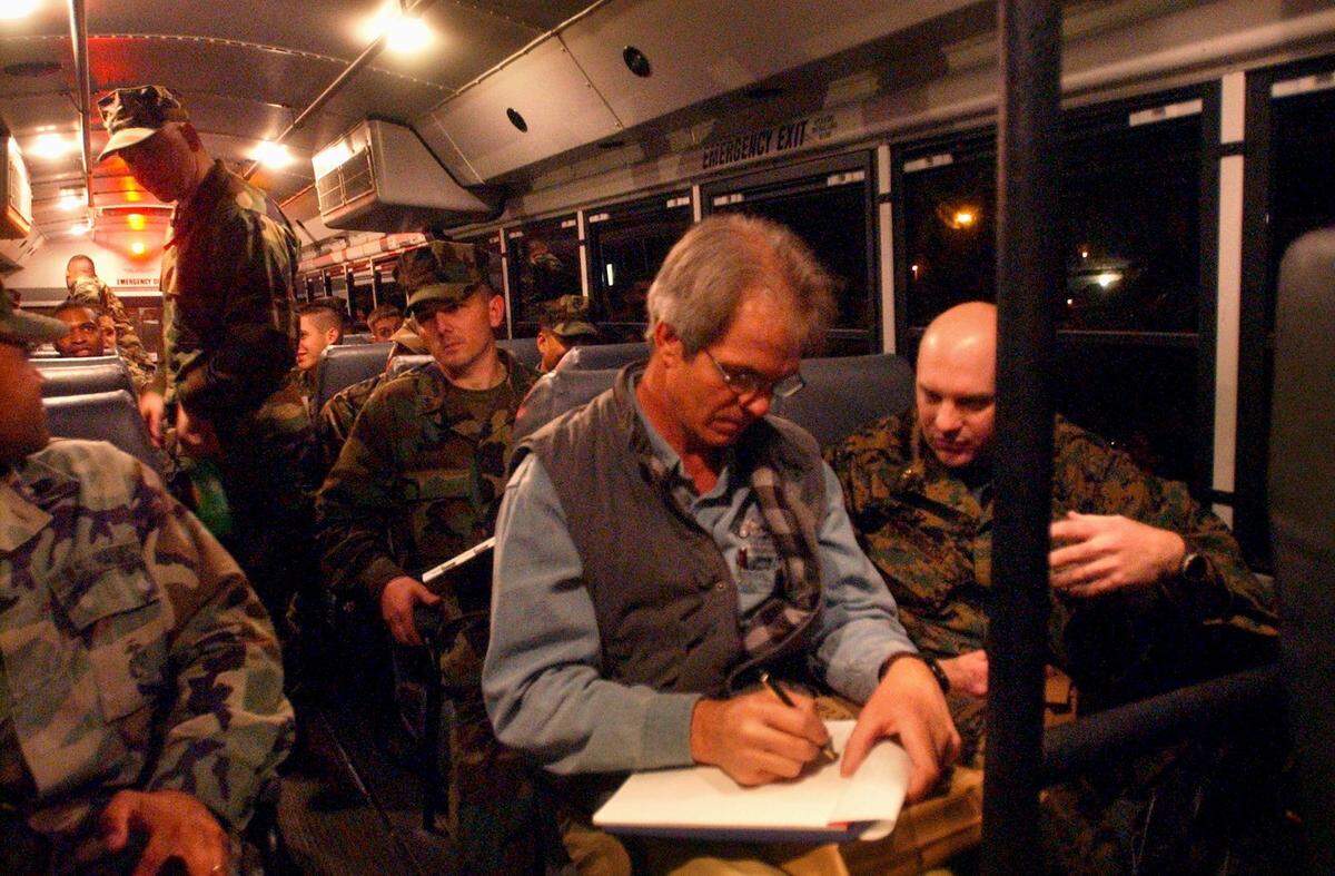 Sun Herald reporter Patrick Peterson gets ready for the long ride to Camp Pendleton California. Peterson and the U.S. Marine Detachment Gulfport, after training at Pendleton, headed toward the Middle East.