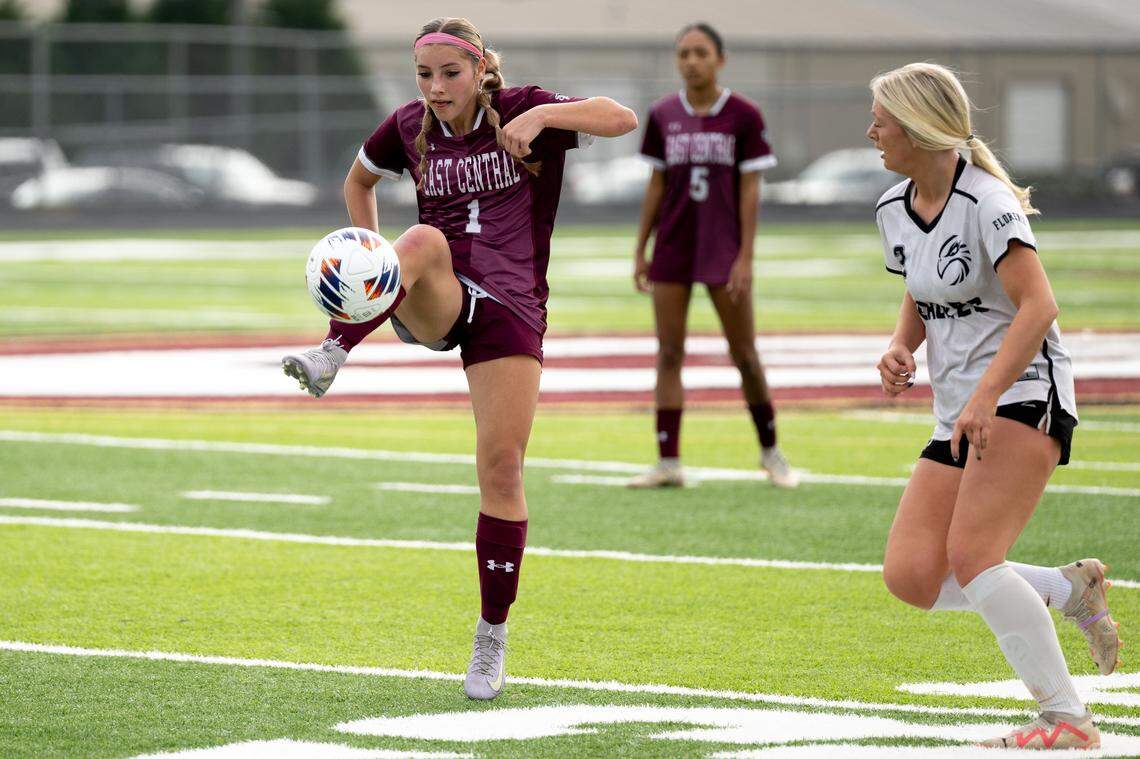East Central's Savannah Hoak (1) attempts to gain control of a loose ball Saturday.