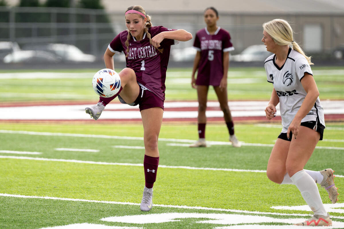East Central's Savannah Hoak (1) attempts to gain control of a loose ball Saturday.