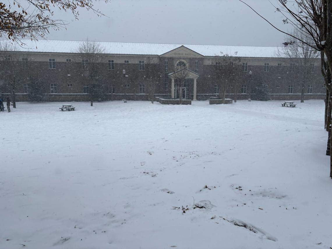 Snow continues to fall Tuesday on the campus of Mississippi Gulf Coast Community College in Perkinston.