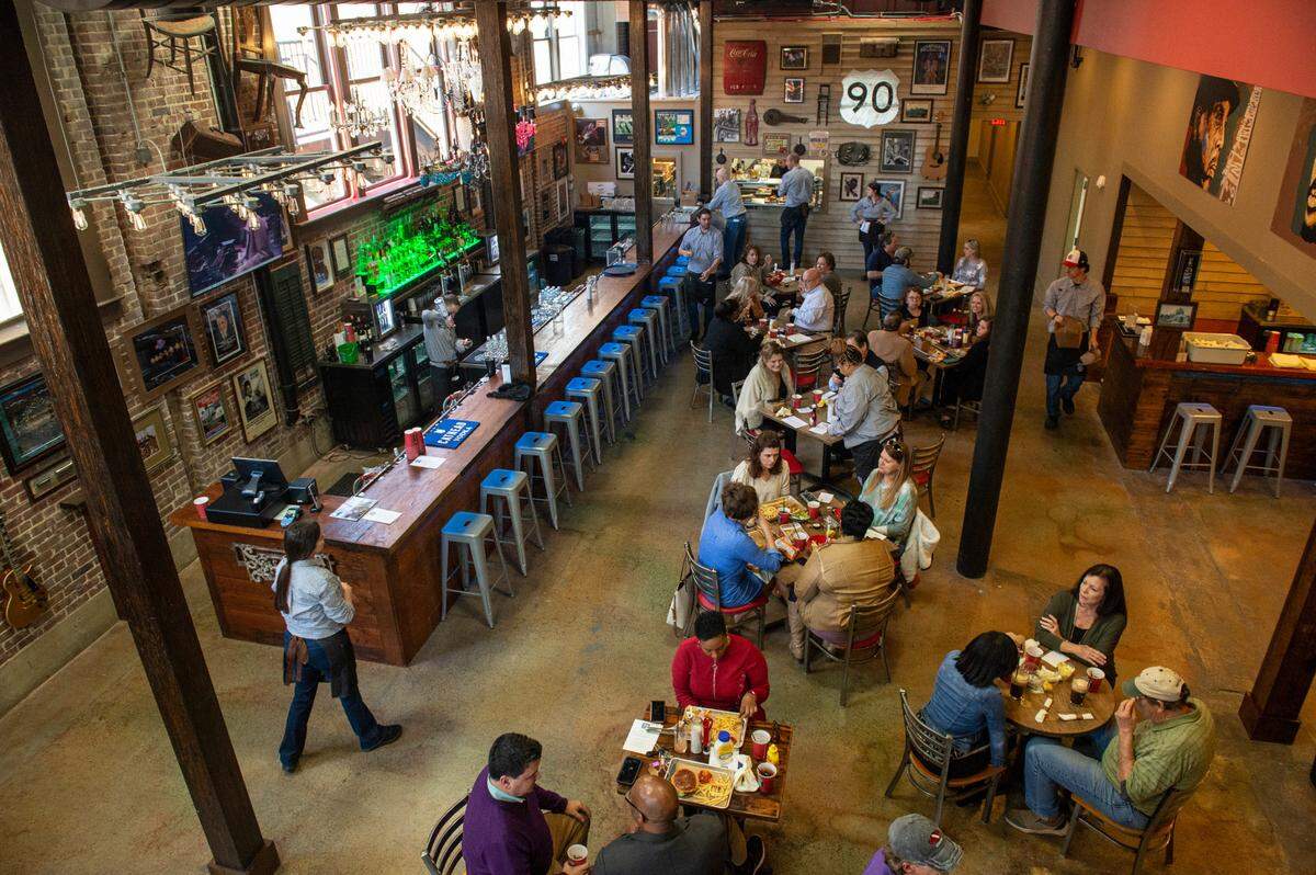 Diners enjoy lunch at the new Ground Zero Blues Club in Biloxi on Thursday, Feb. 10, 2022. The venue will serve lunch and dinner and the menu will feature some of the most popular dishes from the original Ground Zero Blues Club in Clarksdale and some new offerings with Coast flavor.