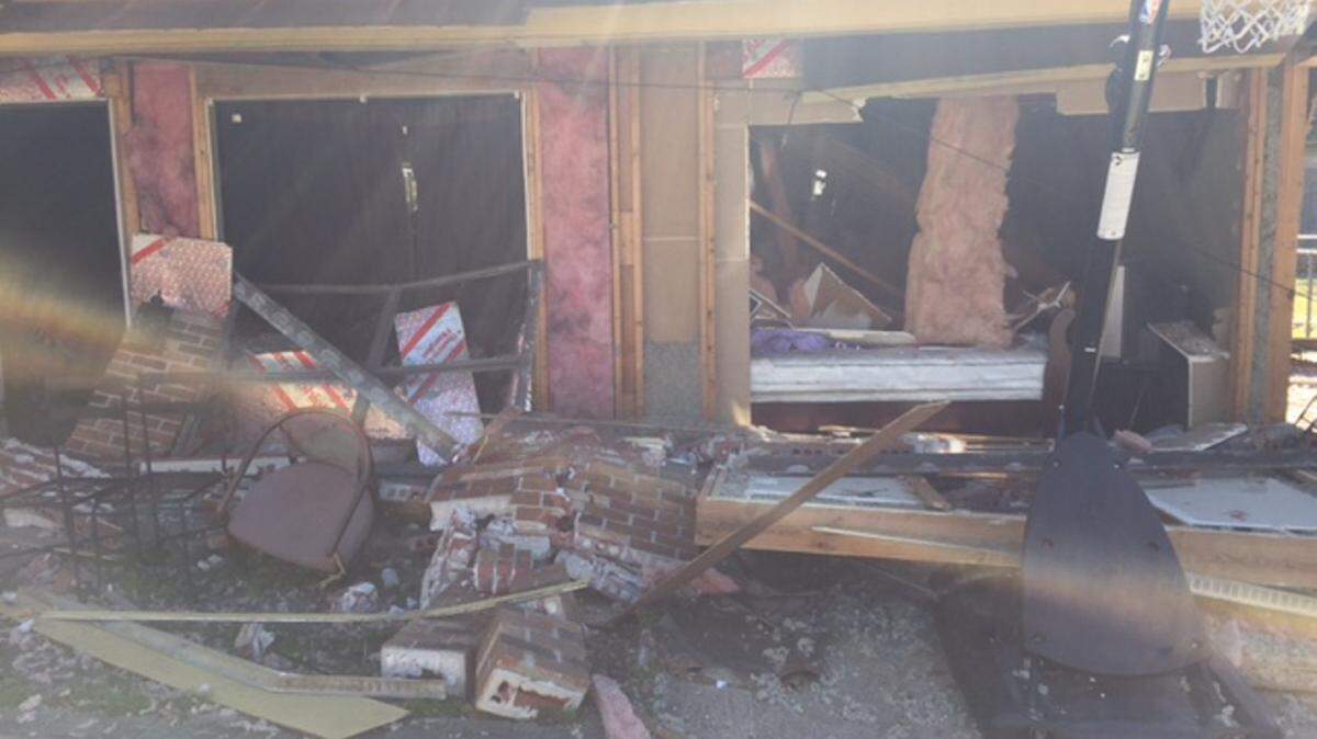 COURTESY MIKE BEYERSTEDT 
 An explsion knocked out a wall and roof of a rental home on Tandy Drive in the Orange Grove community on Wednesday, Feb. 10, 2016.