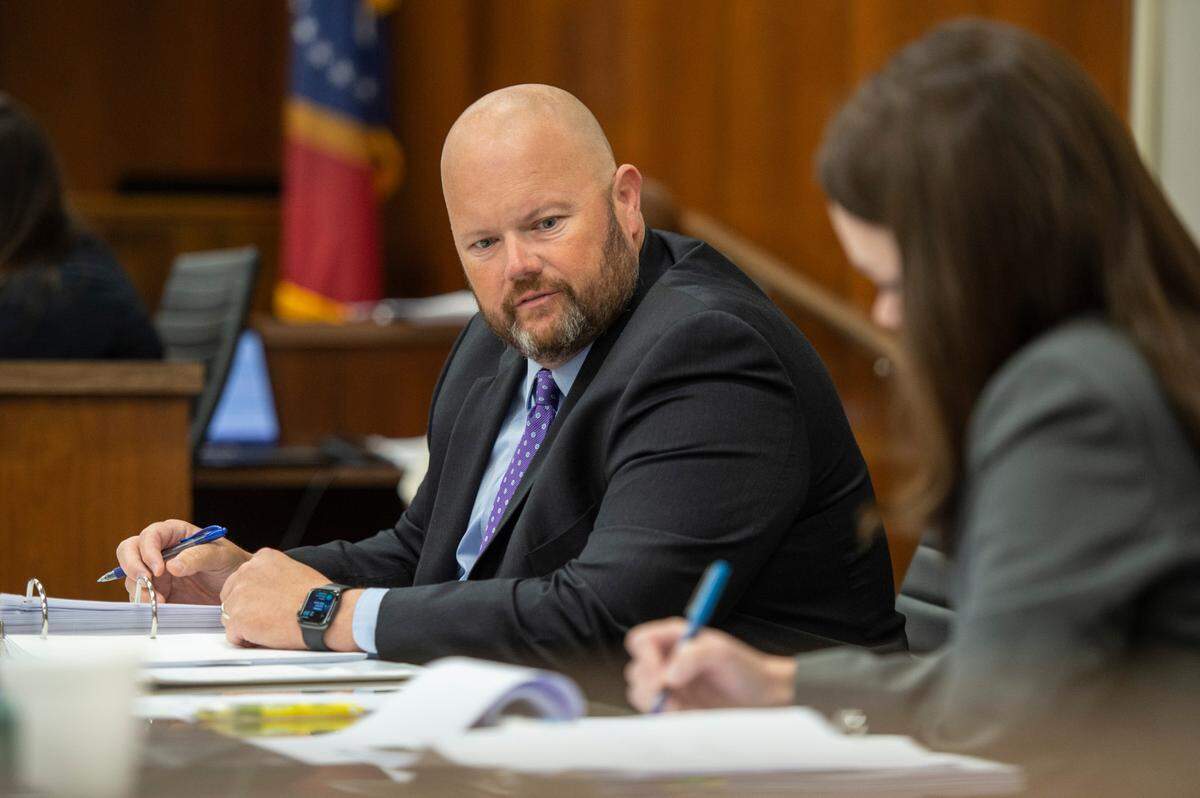 Assistant district attorneys George Huffman and Alison Baker make notes during the defense’s cross examination of a witness during the trial of Cliff Kirkland in Harrison County Circuit Court in Biloxi on Monday, May 16, 2022.
