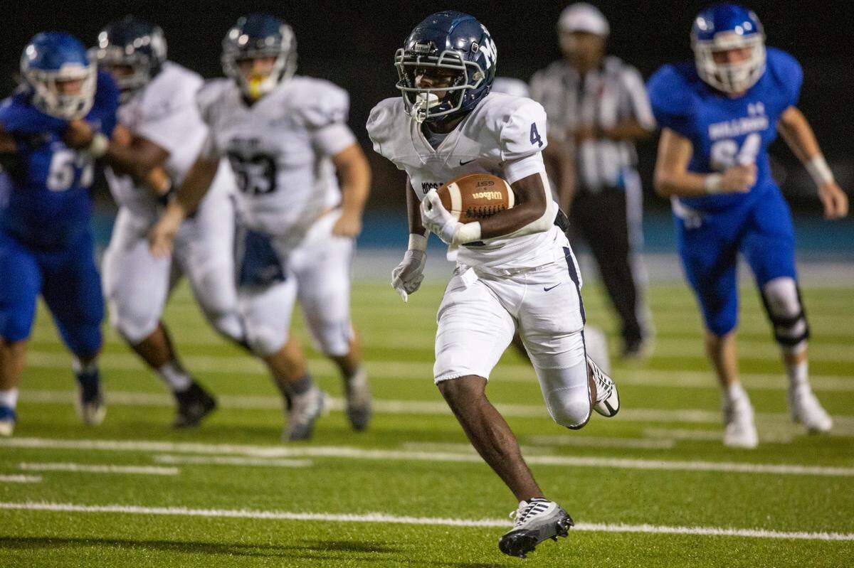 Moss Point’s Lyntavius Feazell (4) runs the ball down the field during a game against Vancleave at Vancleave Football Stadium in Vancleave on Friday, Sept. 9, 2022.