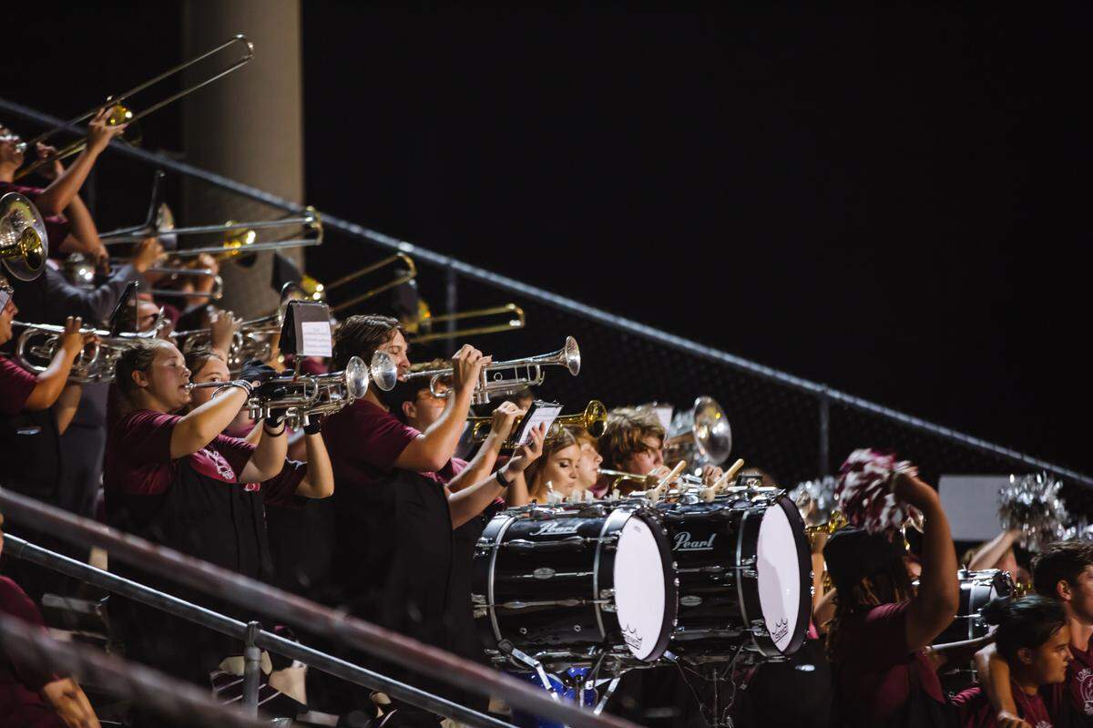 The Long Beach High School marching band at a 2021 season football game.