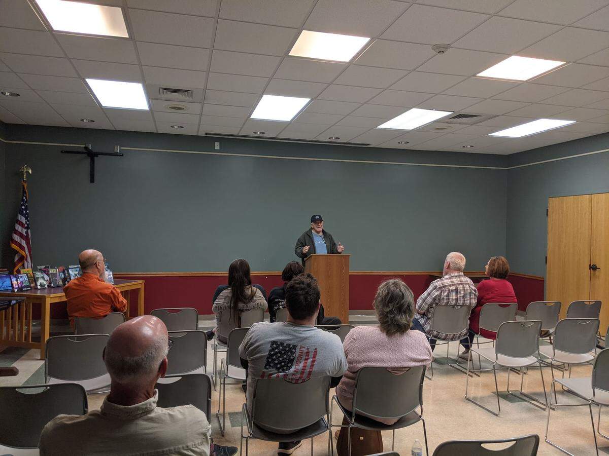 Calvin Parker describes his experiences at the Lucedale-George County Public Library on March 14.