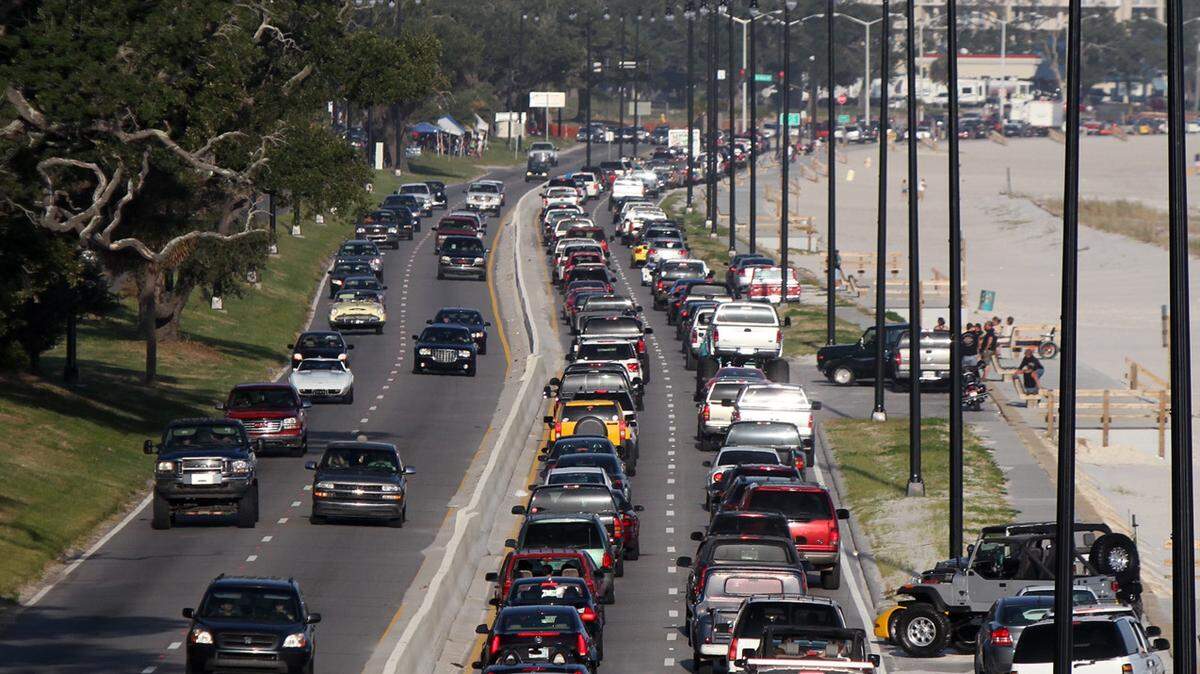 Traffic moves at a snail’s pace as Cruisin’ The Coast slows U. S. 90 to a crawl on October 9, 2011.