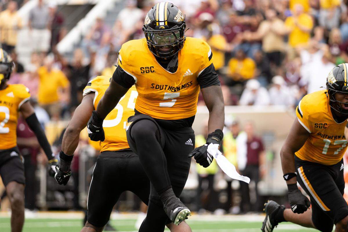 Southern Miss defensive lineman JJ Hawkins (5) celebrates a stop Saturday against Mississippi State.
