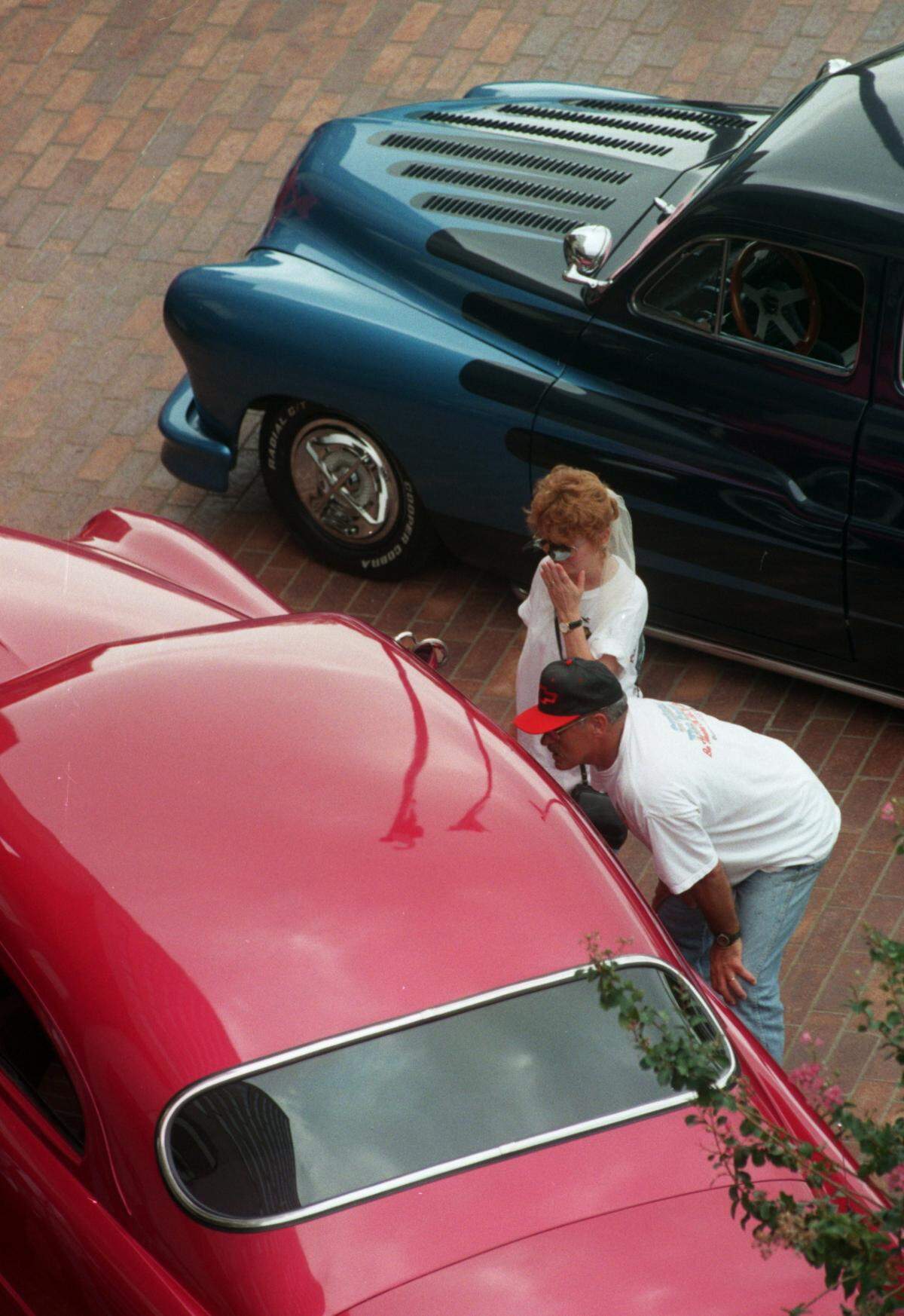 1997: Visitors get a look at classic cars on display during the second Cruisin’ the Coast.
