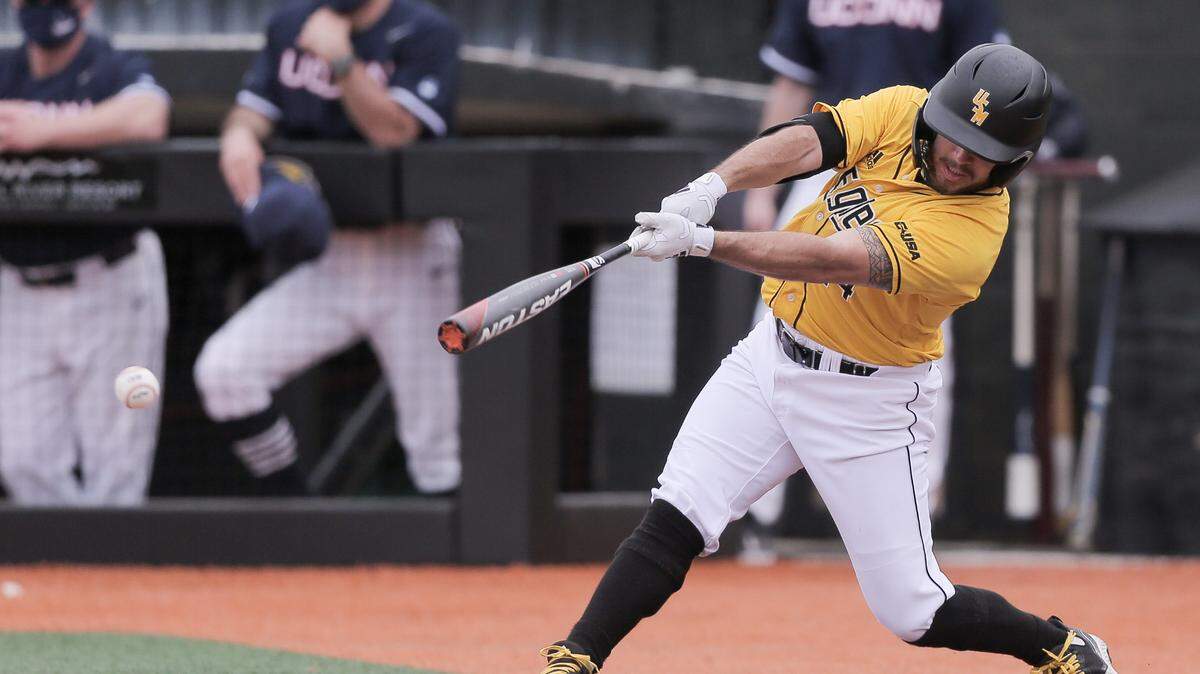 Southern Miss’s Gabe Montenegro (14) takes a swing at the plate against UConn on Saturday, February 27, 2021, in Hattiesburg.