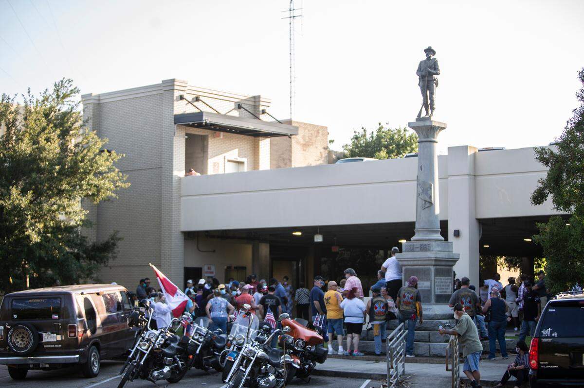 Protesters who want the Confederate monument in Gulfport torn down were met with opposition from the Sons of Confederate Veterans motorcycle group on June 19, 2020, during a protest asking the Harrison County Board of Supervisors to take the monument down.