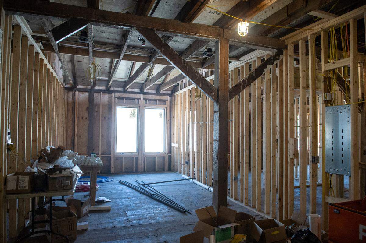A unit with exposed beams new Farragut Lofts in Bay St. Louis on Thursday, June 30, 2022. The lofts are being built in the former McDonald Hardware & Lumber Co. which dates to 1905.