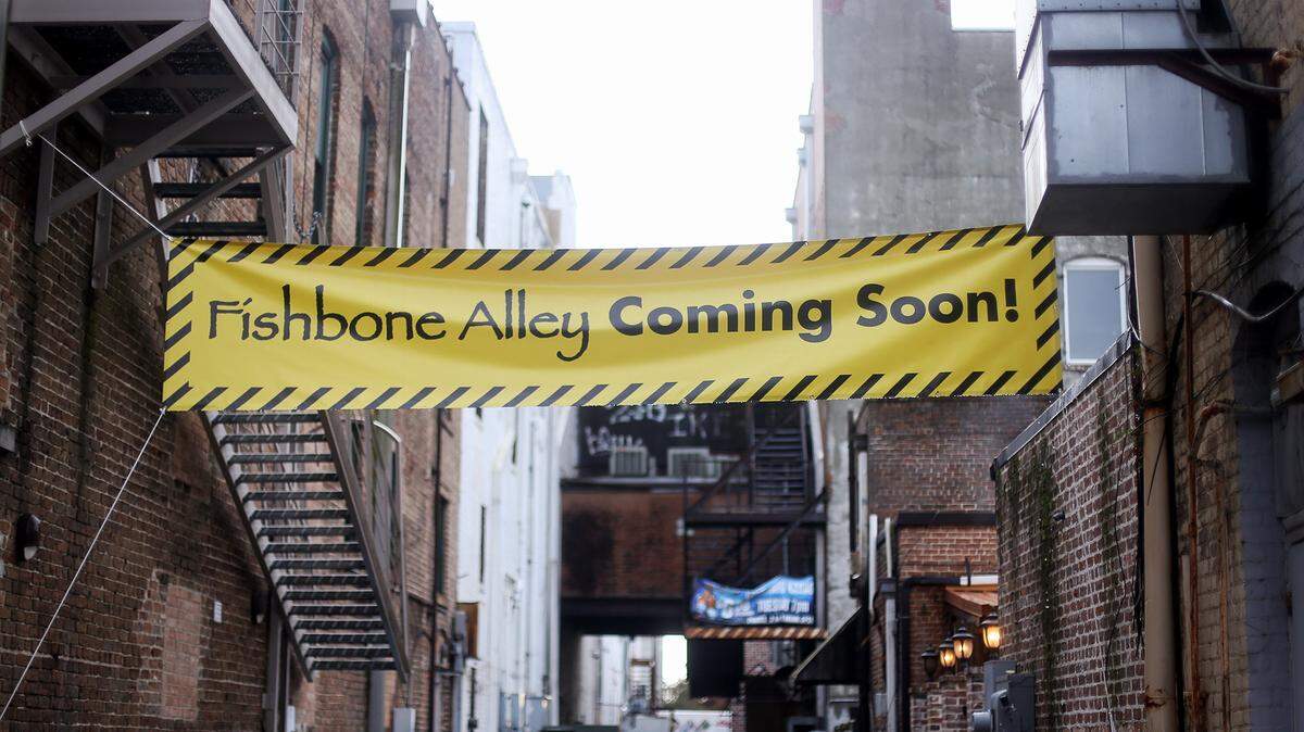 A groundbreaking ceremony was held Wednesday, December 16, 2015, for the Fishbone Alley project in downtown Gulfport. Gov. Phil Bryant signed into law the 'go-cup bill' allowing patrons to bring drinks outside an establishment if it is within a designated entertainment district.