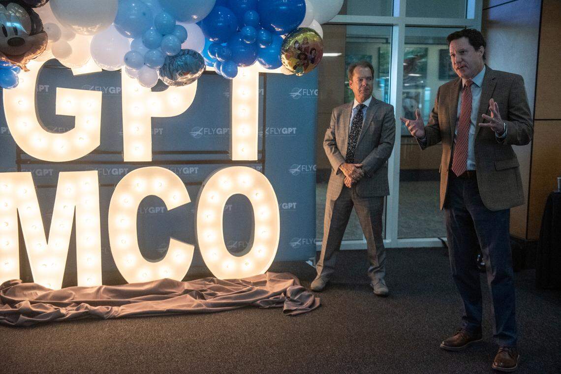 Gulfport-Biloxi International Airport Executive Director Clay Williams and Gulfport Mayor Billy Hewes reveal the latest offering from the Gulfport-Biloxi International Airport during a press conference at the airport on Tuesday, Oct. 1, 2024. Starting in February, Breeze Airlines will begin flying from Gulfport to Orlando.