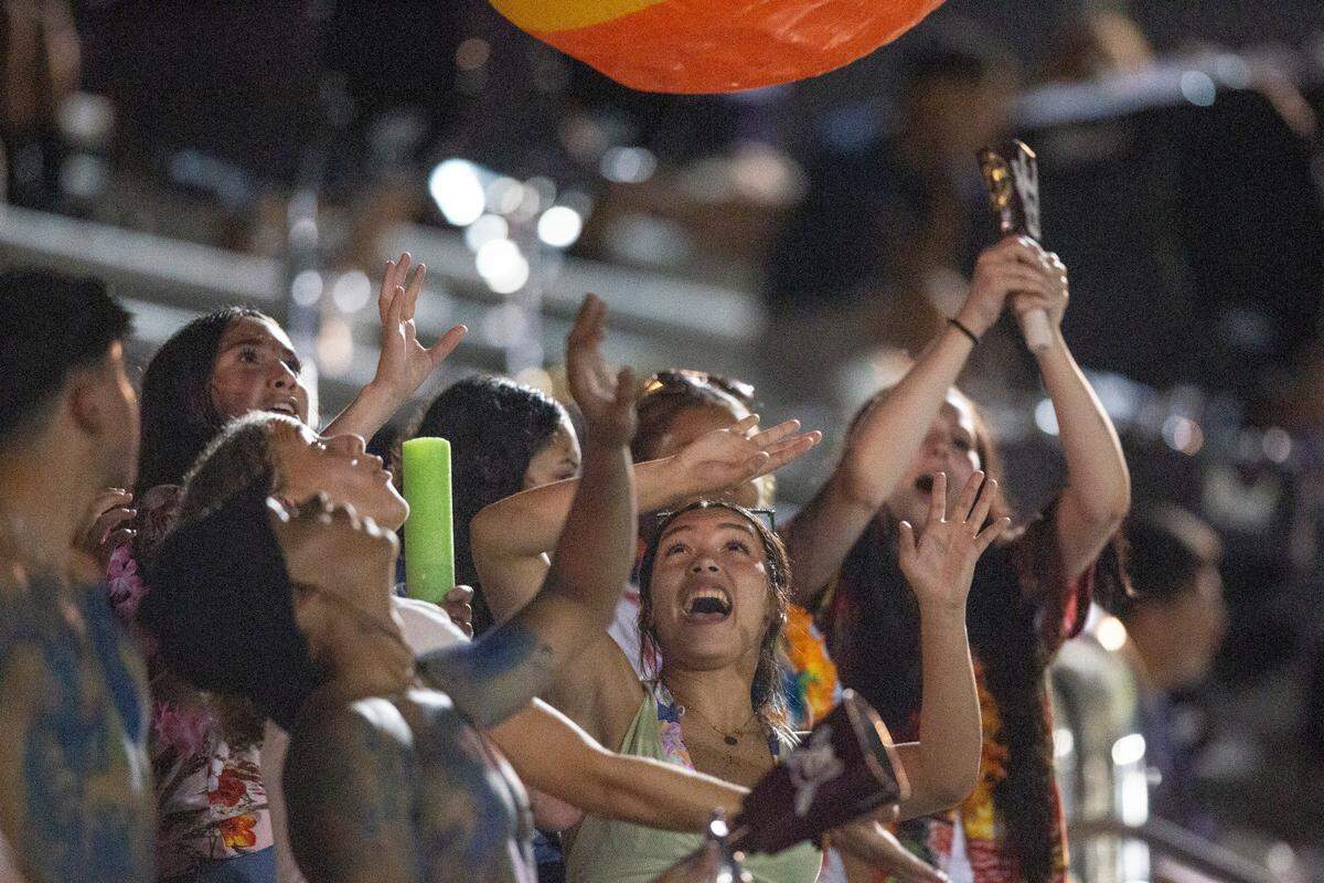 Gautier fans cheer in the stands as their team plays against Pascagoula at Gautier High School in Gautier on Friday, Sept. 2, 2022.
