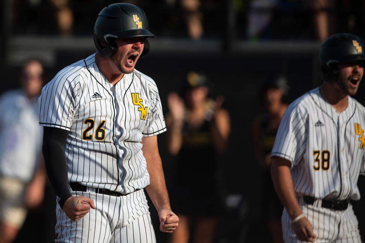 Southern Miss’s Danny Lynch cheers after scoring during the NCAA Regionals at Pete Taylor Park in Hattiesburg on Monday, June 6, 2022.