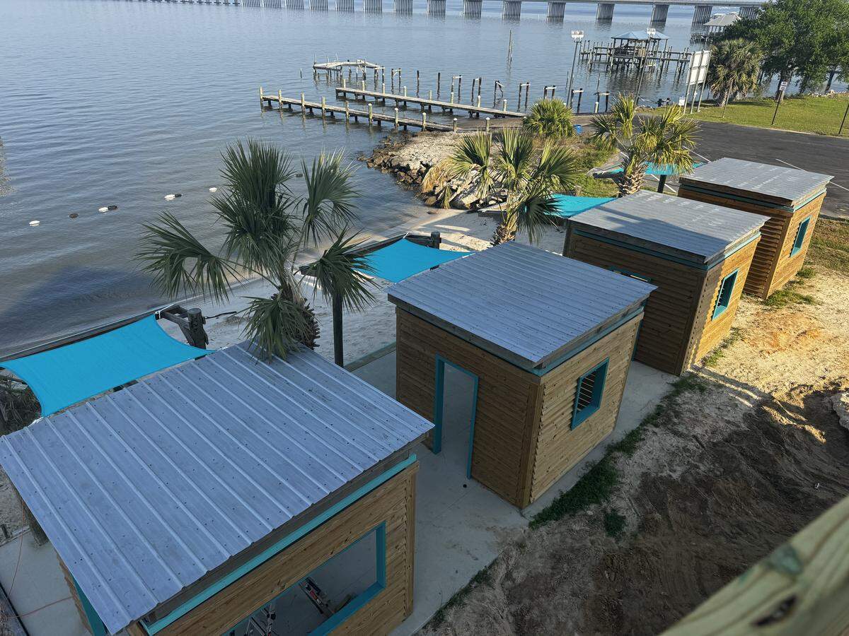 Tiger Beach overlooking the Bay of St. Louis includes four beach cabanas, along with many features boaters will enjoy.