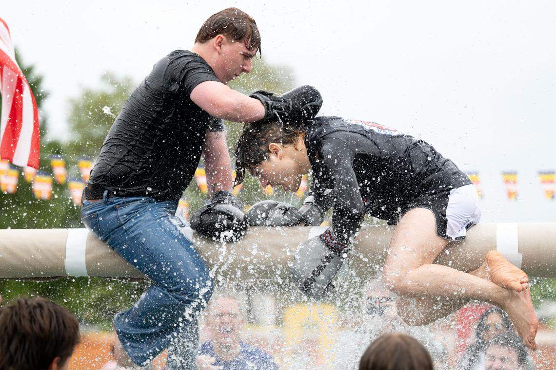 Attendees participate in Thai water boxing during Songkran at the Wat Buddhametta Mahabaramee in Gautier on Sunday, April 19, 2026.