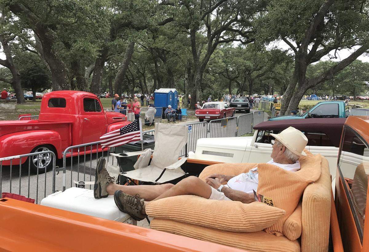 John Mitchell of Diamondhead relaxes in an easy chair in the back of his 1978 Chevy Custom Deluxe pick-up as he watches Cruisers arrive at Cruisin’ Central at Centennial Plaza in Gulfport on Monday, Oct. 2, 2017. Mitchell said the truck belonged to his father and he rescued it from the weeds.
