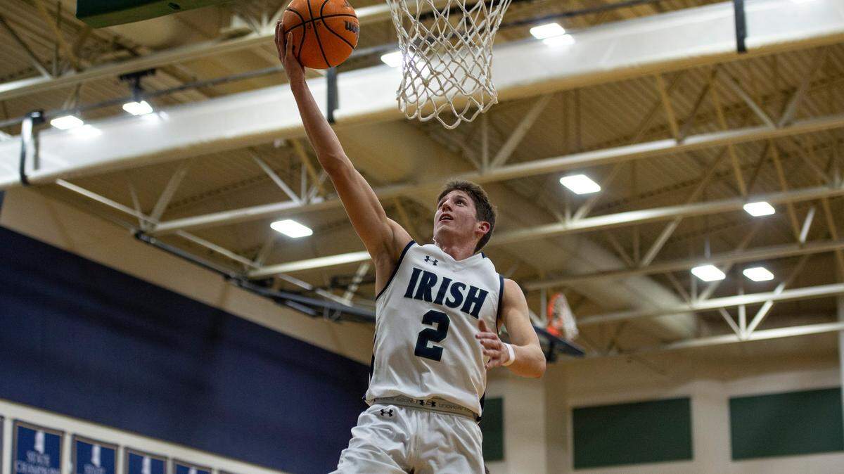 St. Patrick guard Nick Krass scores during a game against Perry Central at St. Patrick Catholic High School on Thursday, Jan. 13, 2022.