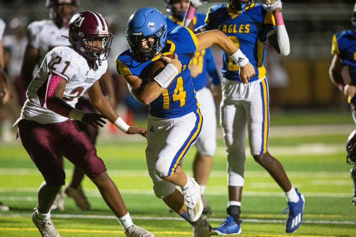 Resurrection quarterback Max Askew runs into the end zone for a touchdown during a game against Richton at Gautier High School in Gautier on Friday, Oct. 14, 2022.