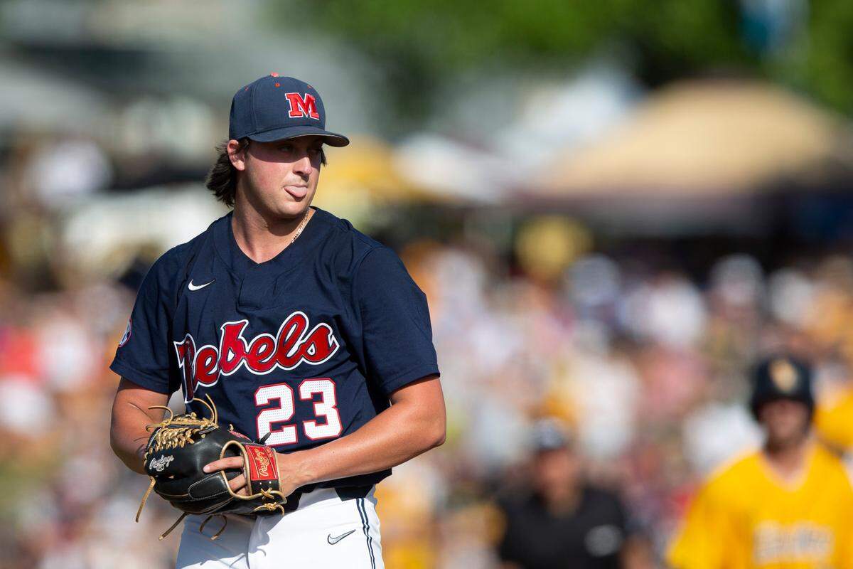 Ole Miss’s Josh Mallitz sticks his tongue out as he pitches against Southern Miss during the Super Regionals Final at Pete Taylor Park in Hattiesburg on Sunday, June 12, 2022.