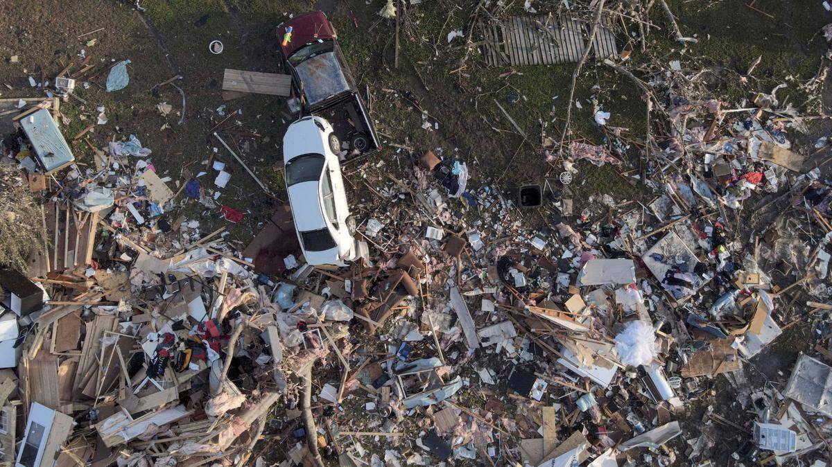 Damage is visible Sunday, March 26, 2023, in Rolling Fork, Miss., after a tornado ripped through the community. Emergency officials in Mississippi say several people have been killed by tornadoes that tore through the state on Friday night, destroying buildings and knocking out power as severe weather produced hail the size of golf balls moved through several southern states. (AP Photo/Julio Cortez)