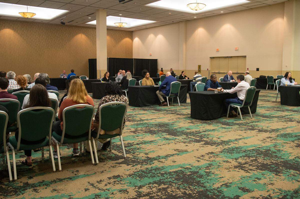 Job applicants are interviewed by hiring staff during a job fair at the Mississippi Coast Coliseum for the new Buc-ee’s in Pass Christian on Wednesday, April 2, 2025.