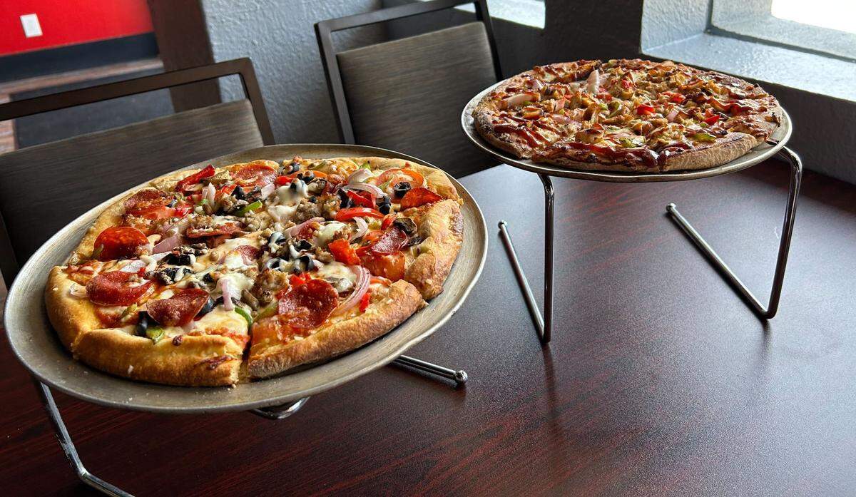 Two pizzas from The G.O.A.T. Sports Bar and Pizzeria in Biloxi, Mississippi.