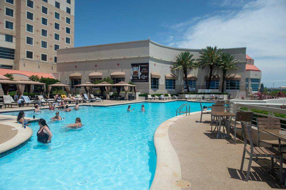 The pool at Harrah’s casino in Biloxi overlooks the beach, and Deer Island. Kids are allowed to swim with their parents and the bar and restaurant are close by.