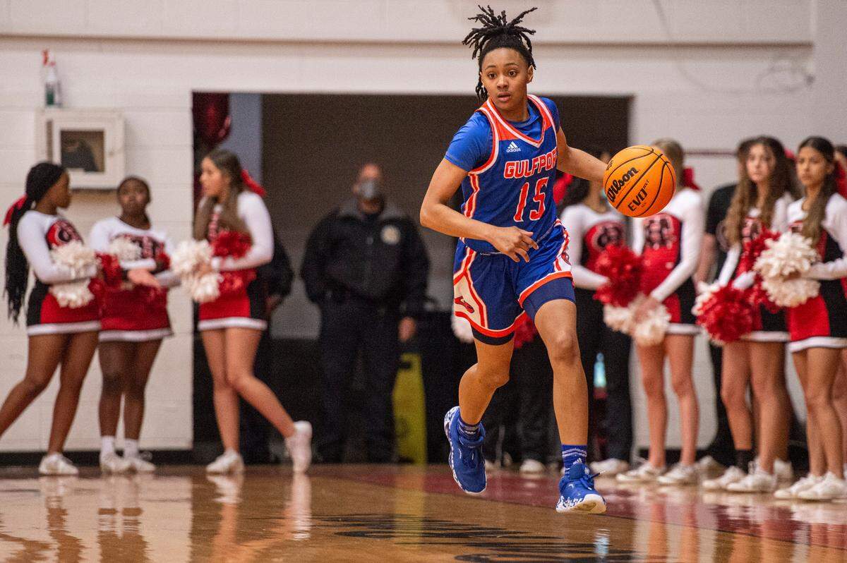 Gulfport’s Simaru Fields dribbles the ball down the court during a game against Harrison Central at Harrison Central High School in Gulfport on Friday, Feb. 4, 2022.