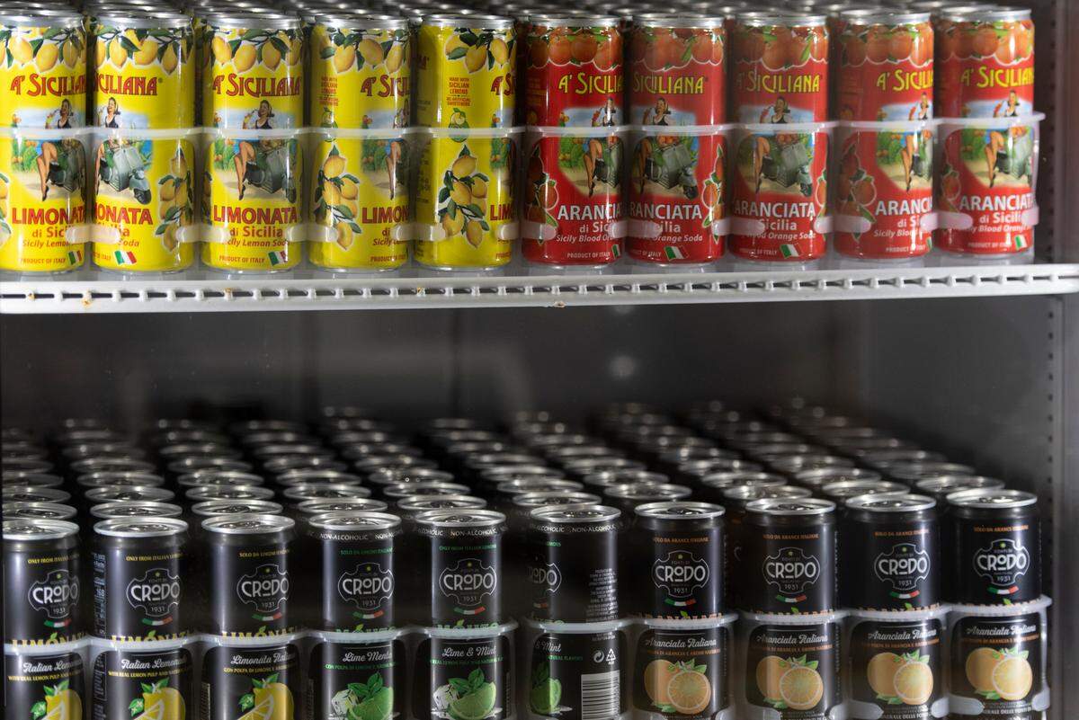 Cans of Italian drinks are for sale at Tavi’s Salumeria in Gulfport. Most of the ingredients and beverages are imported from Italy and Spain.