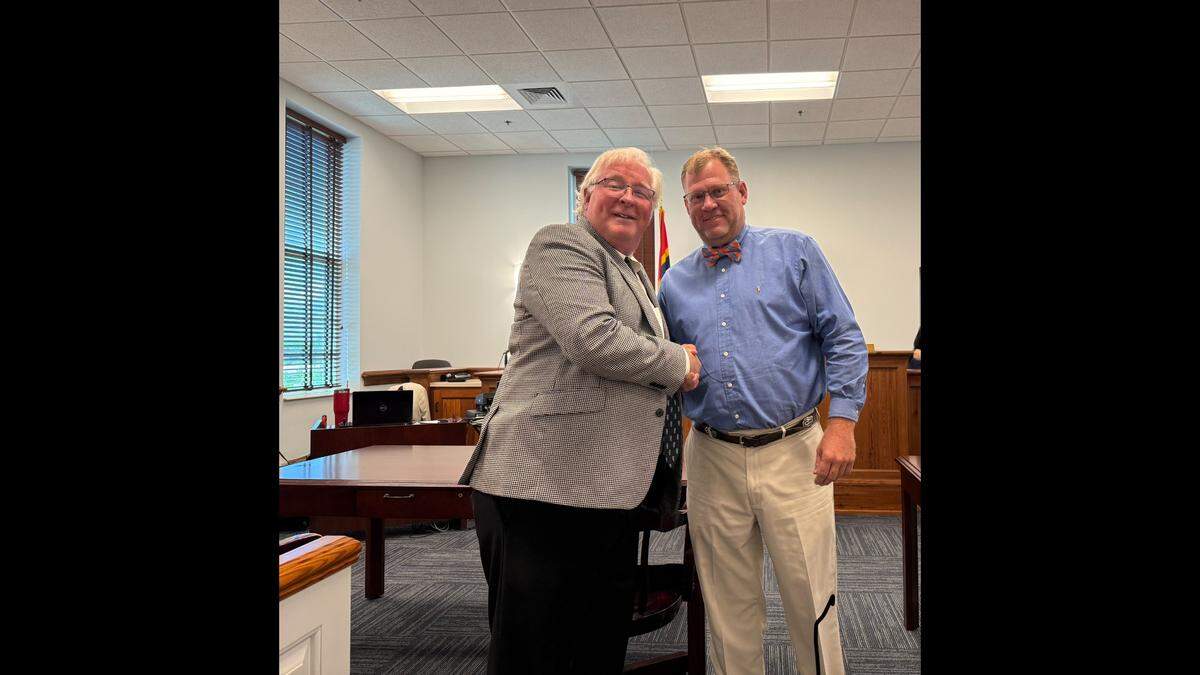 Attorney Tim Holleman and retired Mississippi Highway Patrol Master Sgt. Dale Conrad Decamp Jr. in Hancock County Court on Wednesday, June 11, 2025.