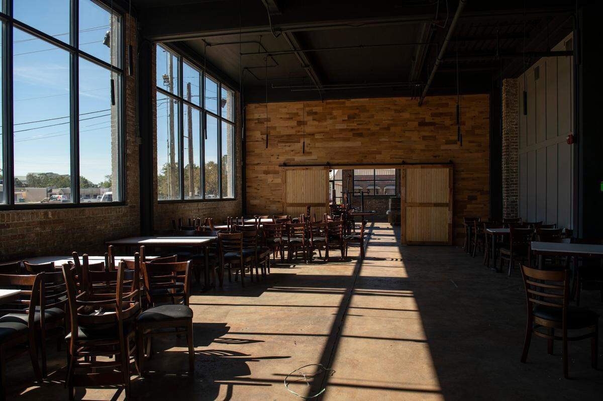 The dining room is filled with light at Sully’s steak and seafood restaurant in Gulfport on Tuesday, Nov. 9, 2021.