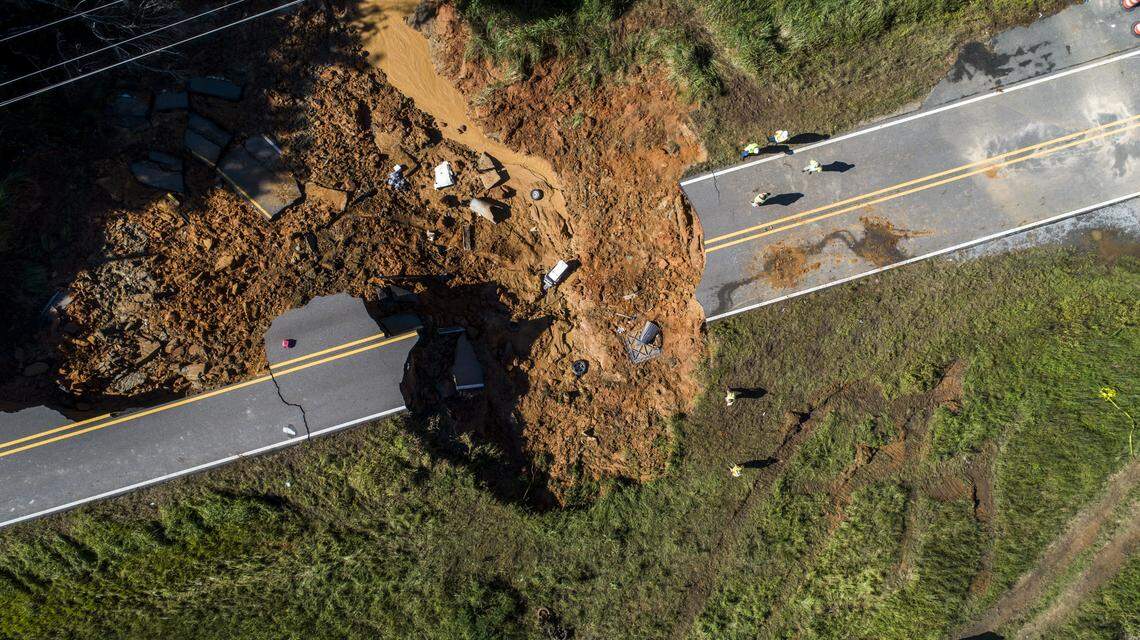 A drone photograph shows the scene where a section Highway 26 collapsed late Monday night, due to heavy rains from Hurricane Ida in the Benndale community in George County, MS Tuesday, Aug. 31, 2021. Two people ere dead and 10 others were injured, three of them critically, the Mississippi Highway Patrol said Tuesday morning.