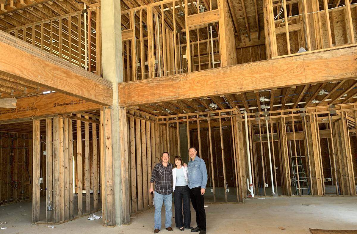 Sean Perkins, who will open a wine shop at The Collective, joins Heather and David Denison, who are bringing a book store to the building on Porter Avenue in Ocean Springs. The stores and a restaurant by the owners of Vestige are expected to open in the summer.