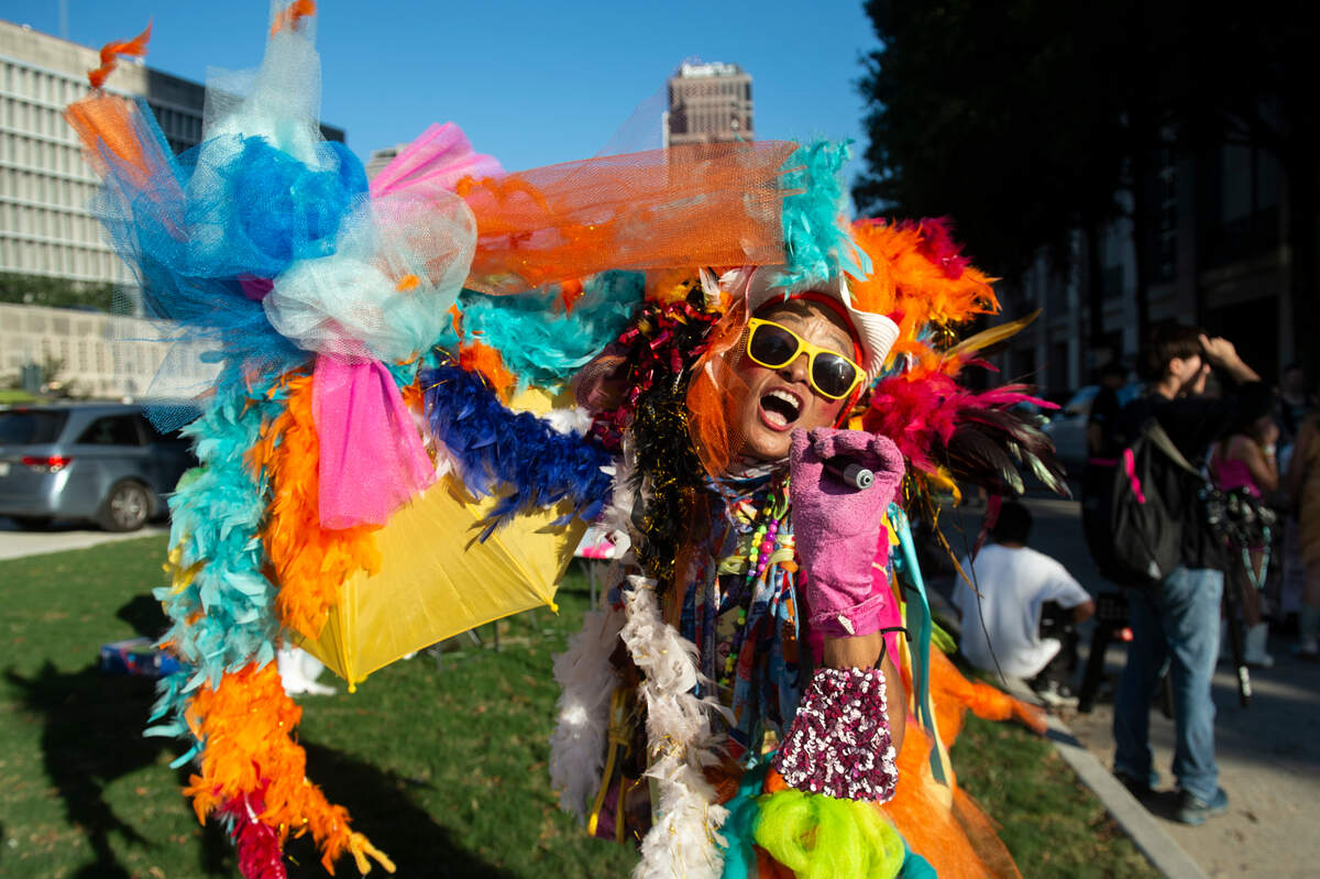 A fan shows off her outfit outside the Cesars Superdome in New Orleans on Friday, Oct. 25, 2024, before Taylor Swift’s Eras Tour performance that night.