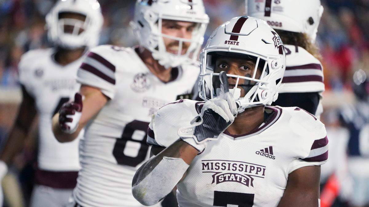 Mississippi State running back Jo’quavious Marks (7) gestures after scoring on a 1-yard touchdown run against Mississippi during the first half of an NCAA college football game in Oxford, Miss., Thursday, Nov. 24, 2022. (AP Photo/Rogelio V. Solis)