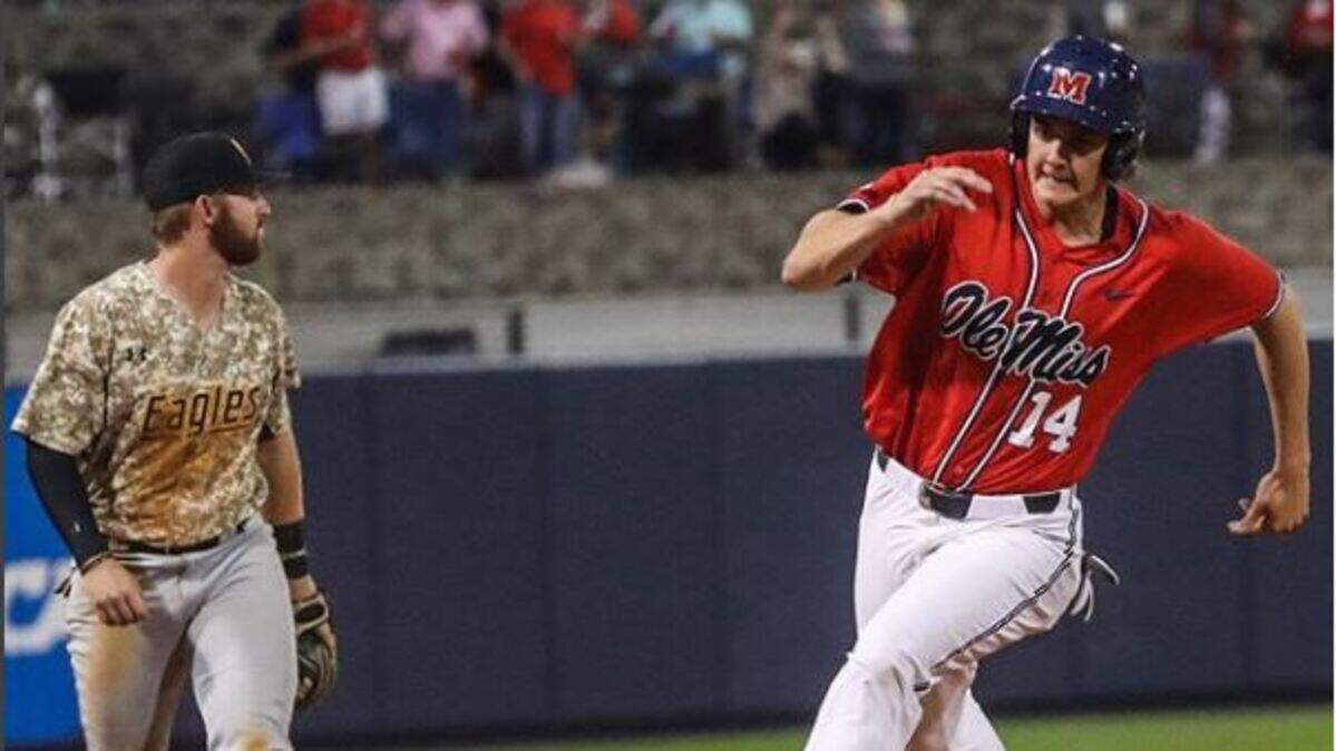 Cole Zabowski rounds first on a base hit against Southern Miss at Trustmark Park in Pearl on Tuesday, April 10, 2018.