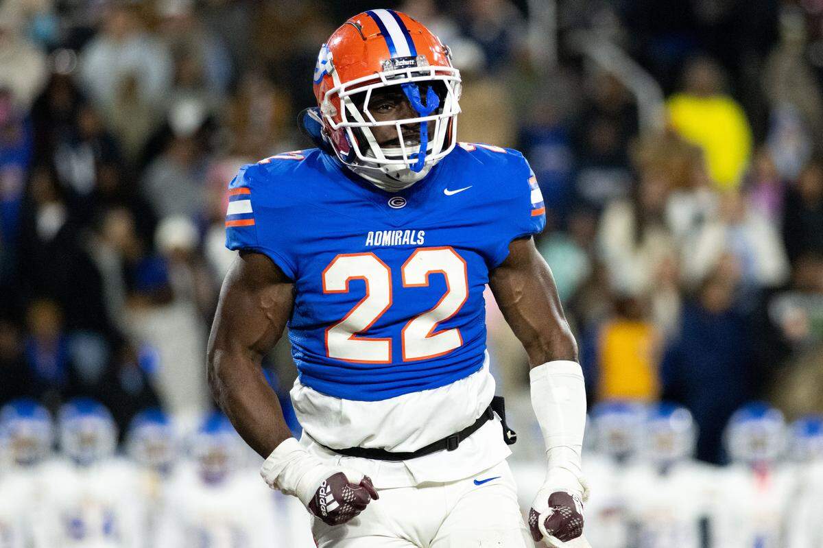 Gulfport linebacker Andre Peters III (22) celebrates a tackle for loss during the Admirals’ state title win over Tupelo.
