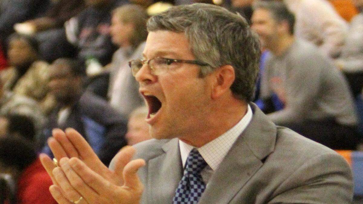JOHN FITZHUGH/SUN HERALD 
 Gulfport head coach Owen Miller encourages his team during the second quarter of their game against Harrison Central at Bert Jenkins gym in Gulfport on Friday Jan. 29, 2016.