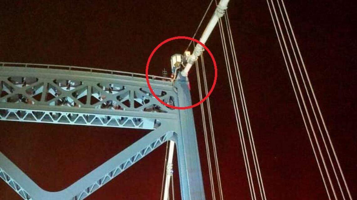 Authorities in Toledo, Ohio had to rescue a woman from the High Level Bridge on Tuesday after she climbed it to take a selfie for social media.