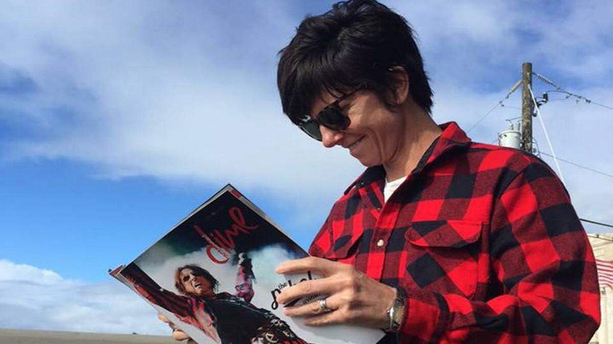 COURTESY JANE CLAIR TYNER 
 Tig Notaro reads Dime Magazine on Monday at Cat Island Coffeehouse and Pass Christian Books on Davis Avenue after her October 2015 wedding.