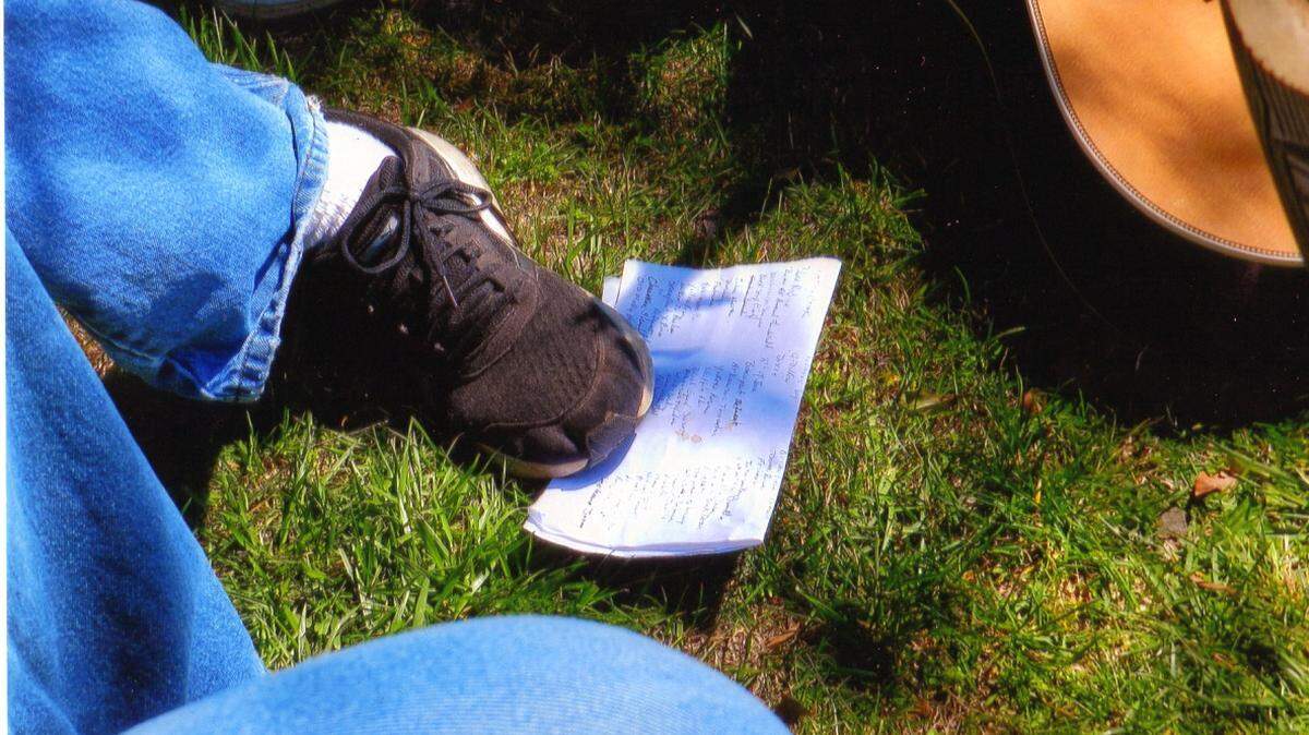 KAT BERGERON/SPECIAL TO THE SUN HERALDA handwritten playlist at the feet of musicians gathered for a formal or informal session of bluegrass or perhaps Irish reels hints at some foot-tapping music to come.