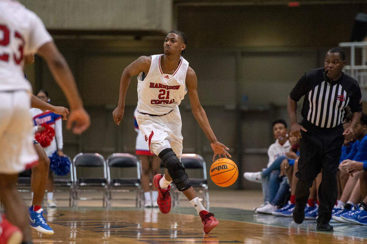 Harrison Central forward Sam Murray dribbles the ball up the court during Hoopsfest at the Mississippi Coast Coliseum in Biloxi on Saturday, Jan. 29, 2022.