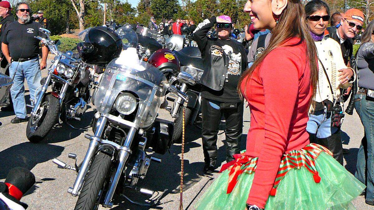 SUN HERALD/FILEAthena Bourne of Long Beach, ASGARD's 'Miss Blowout 2012,' was a Christmas elf for the group's 28th annual Toy Run motorcycle ride. The Mississippi Gulf Coast Memorial Day Blowout raises funds for local charities.