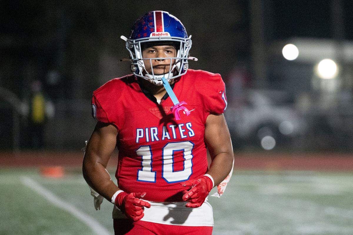 Pass Christian linebacker Jayden Taylor walks off the field at halftime during a football game at Pass Christian High School on Friday, Nov. 7, 2025.
