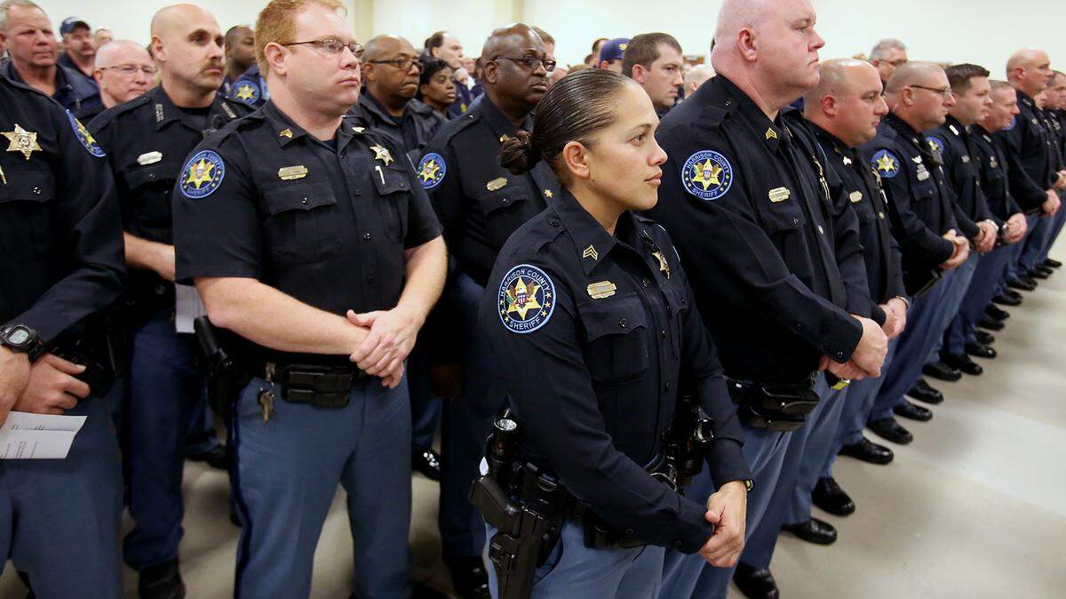 AMANDA McCOY/SUN HERALDHarrison County Sheriff's Office deputies stand ready to be sworn in by Sheriff Troy Peterson on Jan. 4, 2016, at the Lyman Community Center in Gulfport. The new sheriff said restoring civil service protection is one of his goals.